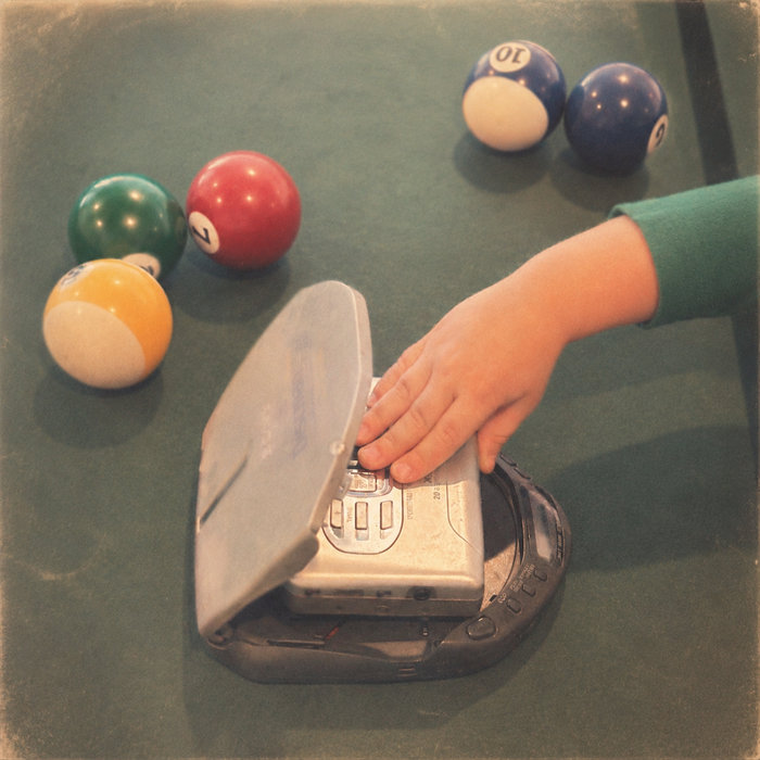 Dancing album cover — a pool table in a dim room